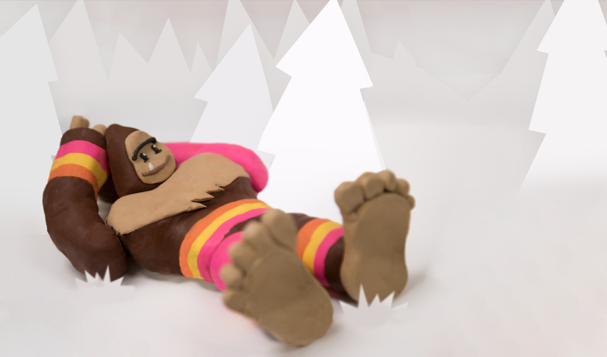 image of clay bigfoot reclining