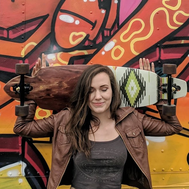 image of Susan Pallmann with her longboard